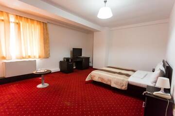 Фото номера Стандартный двухместный номер с 1 кроватью Отель Hotel Corona г. Дробета-Турну- Севери 16